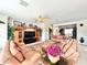 Open living room with comfortable seating and large screen TV at 8557 La Isla Dr, Kissimmee, FL 34747