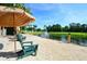 Enjoy tranquil pond views with a fountain, relax on the chairs and soak in the sunshine at 8557 La Isla Dr, Kissimmee, FL 34747