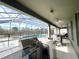 Screened pool and patio with built-in grill and seating at 8557 La Isla Dr, Kissimmee, FL 34747