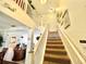 Elegant staircase leads to the second floor at 8557 La Isla Dr, Kissimmee, FL 34747