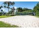 Enjoy a friendly game on the sand volleyball court, a fun amenity for residents and guests at 8557 La Isla Dr, Kissimmee, FL 34747