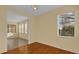 Bright dining area with hardwood floors and adjacent room at 8737 Leeland Archer Blvd, Orlando, FL 32836