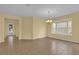 Bright dining room with tile flooring and a bay window at 8737 Leeland Archer Blvd, Orlando, FL 32836