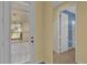View of the entryway showing a door and access to a bathroom at 8737 Leeland Archer Blvd, Orlando, FL 32836