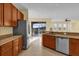 Spacious kitchen, granite countertops, stainless steel appliances at 8737 Leeland Archer Blvd, Orlando, FL 32836