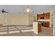 Modern kitchen with stainless steel appliances and island at 8737 Leeland Archer Blvd, Orlando, FL 32836