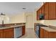 Modern kitchen with stainless steel appliances and island at 8737 Leeland Archer Blvd, Orlando, FL 32836