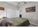 Guest bedroom with a full-size bed and closet at 8899 Fallen Oak Dr, Davenport, FL 33836