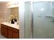 Double vanity bathroom with a large shower at 904 Assembly Ct, Reunion, FL 34747