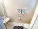 Small bathroom with pedestal sink and toilet at 904 Assembly Ct, Reunion, FL 34747