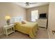 Charming bedroom with a full-size bed and a white dresser at 904 Assembly Ct, Reunion, FL 34747