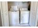 Convenient laundry closet with washer and dryer at 904 Assembly Ct, Reunion, FL 34747