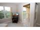 Living room with access to a balcony overlooking a golf course at 904 Assembly Ct, Reunion, FL 34747