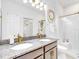 Modern bathroom with double vanity and walk-in shower at 905 Desmoines Way, Poinciana, FL 34759