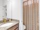 Bathroom with granite vanity and shower/tub combo at 905 Desmoines Way, Poinciana, FL 34759