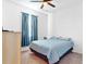 Spacious bedroom with light carpet and ceiling fan at 905 Desmoines Way, Poinciana, FL 34759
