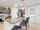 Modern kitchen with stainless steel appliances and granite countertops at 905 Desmoines Way, Poinciana, FL 34759