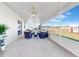 Large screened patio with seating area and grill at 905 Desmoines Way, Poinciana, FL 34759