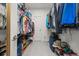 Large walk-in closet with ample shelving and hanging space at 939 Braewood Dr, Clermont, FL 34715