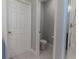 Small bathroom with toilet and shower at 10415 Austrina Oak Loop, Winter Garden, FL 34787