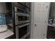 Updated kitchen features double ovens and ample cabinet space at 10415 Austrina Oak Loop, Winter Garden, FL 34787