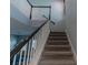 Modern staircase, showcasing a clean and contemporary design at 10415 Austrina Oak Loop, Winter Garden, FL 34787