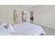 Bedroom with a double bed and access to bathroom and additional rooms at 1066 Quaker Ridge Ln, Davenport, FL 33896