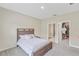 Bright bedroom with double bed, large closet, and carpet flooring at 1066 Quaker Ridge Ln, Davenport, FL 33896