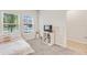 Cozy bedroom with a twin-size bed and built-in shelving at 1066 Quaker Ridge Ln, Davenport, FL 33896