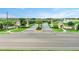 Gated entrance to the ChampionsGate community, featuring a landscaped entryway and golf course views at 1066 Quaker Ridge Ln, Davenport, FL 33896