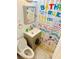Clean bathroom with single vanity and shower/tub combo at 1504 Hummingbird Ln, Lakeland, FL 33801