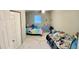 Cozy bedroom with two twin beds and ample closet space at 1504 Hummingbird Ln, Lakeland, FL 33801
