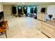 Spacious bedroom with large format tile and lots of natural light at 1504 Hummingbird Ln, Lakeland, FL 33801
