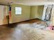 Unfinished garage with space for vehicles and storage at 1504 Hummingbird Ln, Lakeland, FL 33801
