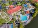 Aerial view of community pool, clubhouse, and recreational areas at 160 Hideaway Beach Ln, Kissimmee, FL 34746