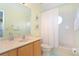 Simple bathroom with single vanity, shower/tub combo at 160 Hideaway Beach Ln, Kissimmee, FL 34746
