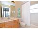 Clean bathroom with tub, shower, and sink at 160 Hideaway Beach Ln, Kissimmee, FL 34746