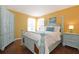 Bedroom with queen bed and light blue furniture at 160 Hideaway Beach Ln, Kissimmee, FL 34746