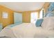 Bedroom with queen bed and light blue furniture at 160 Hideaway Beach Ln, Kissimmee, FL 34746