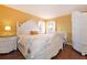 Bedroom with white ornate bed frame and a crib at 160 Hideaway Beach Ln, Kissimmee, FL 34746