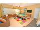 Game room with pool table, foosball, and seating area at 160 Hideaway Beach Ln, Kissimmee, FL 34746