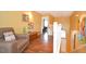 Upstairs hallway with comfortable seating area and art at 160 Hideaway Beach Ln, Kissimmee, FL 34746