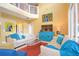 Spacious living area featuring vibrant decor and natural light at 160 Hideaway Beach Ln, Kissimmee, FL 34746