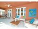 Covered patio with comfortable seating and access to the pool at 160 Hideaway Beach Ln, Kissimmee, FL 34746