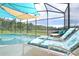 Comfortable lounge chairs for relaxing by the pool at 160 Hideaway Beach Ln, Kissimmee, FL 34746