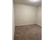 Well-lit bedroom with neutral walls and plush carpeting at 1655 Aspen Ave, Davenport, FL 33837