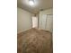 Bright bedroom featuring neutral walls and carpeting at 1655 Aspen Ave, Davenport, FL 33837