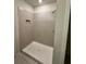 Large walk-in shower with neutral-toned tile surround at 1655 Aspen Ave, Davenport, FL 33837