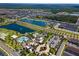 Aerial view of a community with pools, lakes, and lush landscaping at 1829 Tropical Palms Cir Cir, Kissimmee, FL 34747