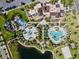 Community pool, playground, and clubhouse aerial view at 1829 Tropical Palms Cir Cir, Kissimmee, FL 34747